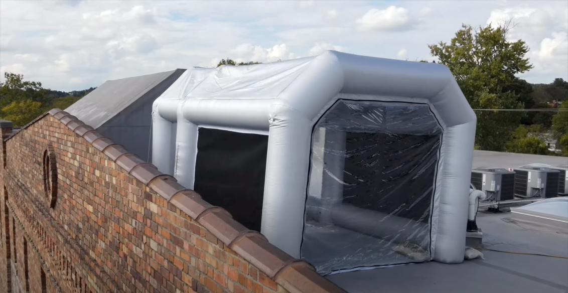 Inflatable paint booth