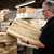 Chris inspecting our WoodStax selection of Black Limba body blanks for guitar building.
