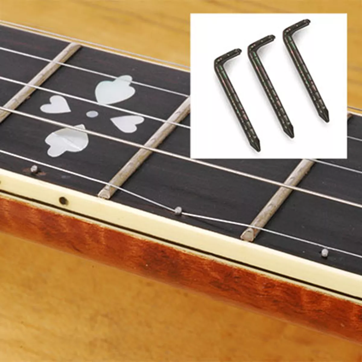 5. String Capo Spikes, Packung mit 15 Stück 5. String Capo Spikes, Packung mit 15 Stück