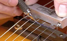 Ablage E-String Slots