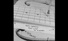 Shimming the fretboard