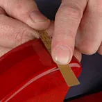 Reparatur mit Mikro-Finishing-Papier abschließen