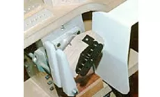 Abstandshalter für Aufwickler aufnehmen