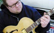 Elliot with guitar