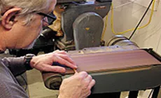 Schleifen des Riemens