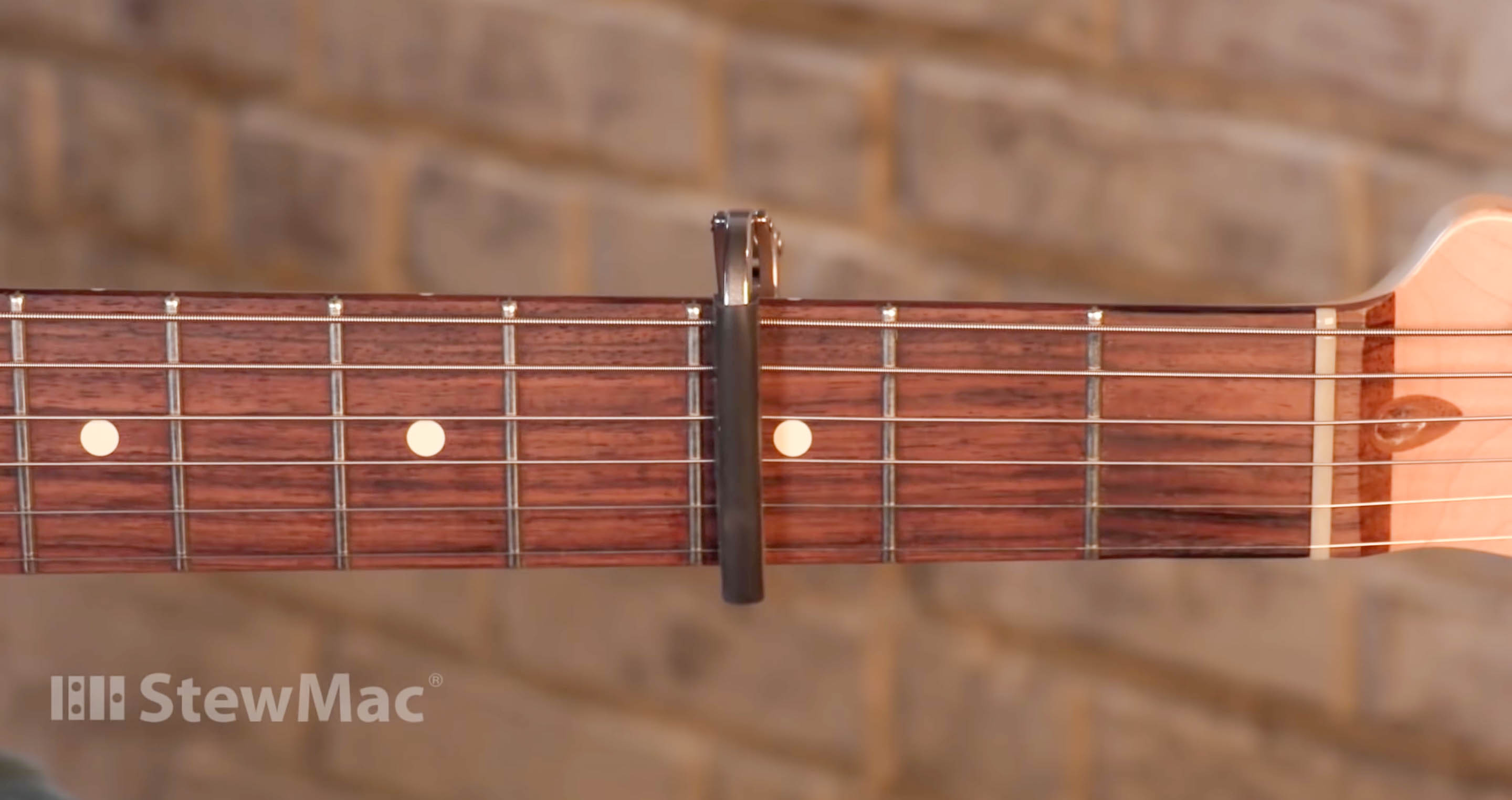 Ordnungsgemäße Platzierung des Gitarrencapos