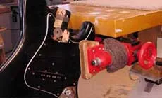 Spannbacke, die Strat. hält